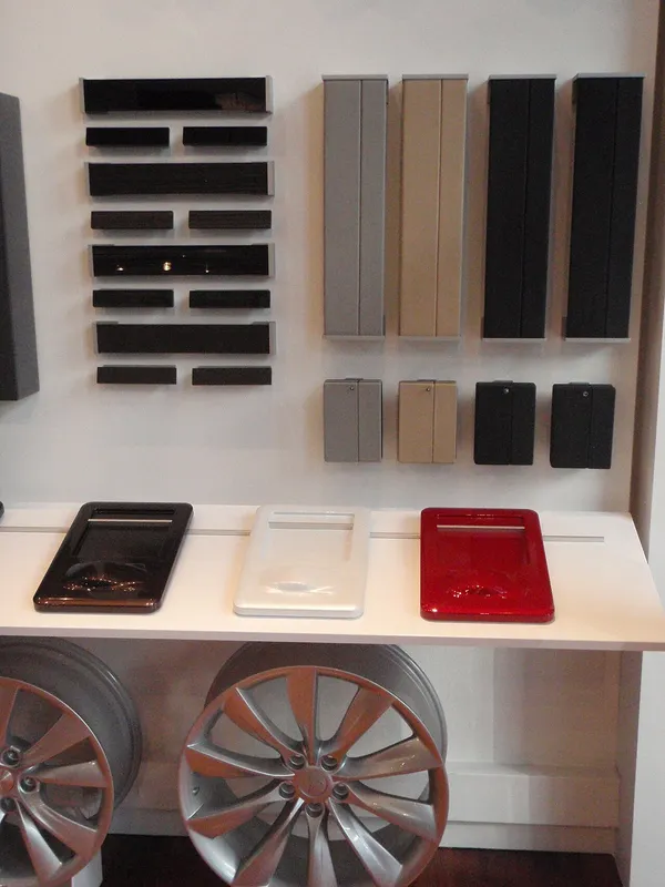 Tesla Store with samples of interior, paint and 19 Cyclone (bottom left) and 21 Turbine wheels (botton right)